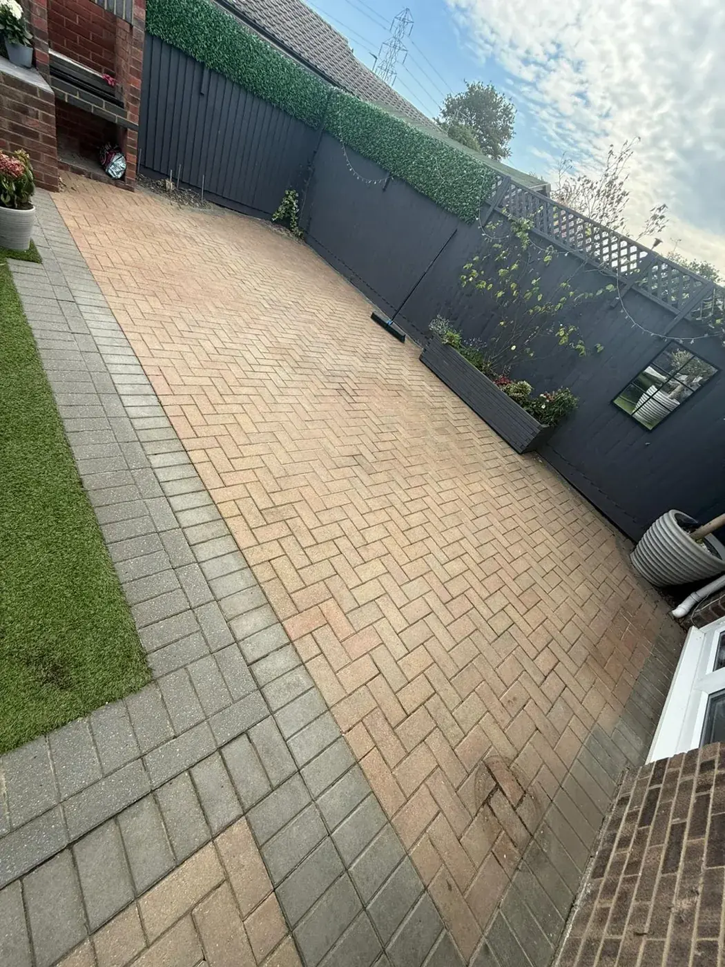 A side path and patio finished after jet washing